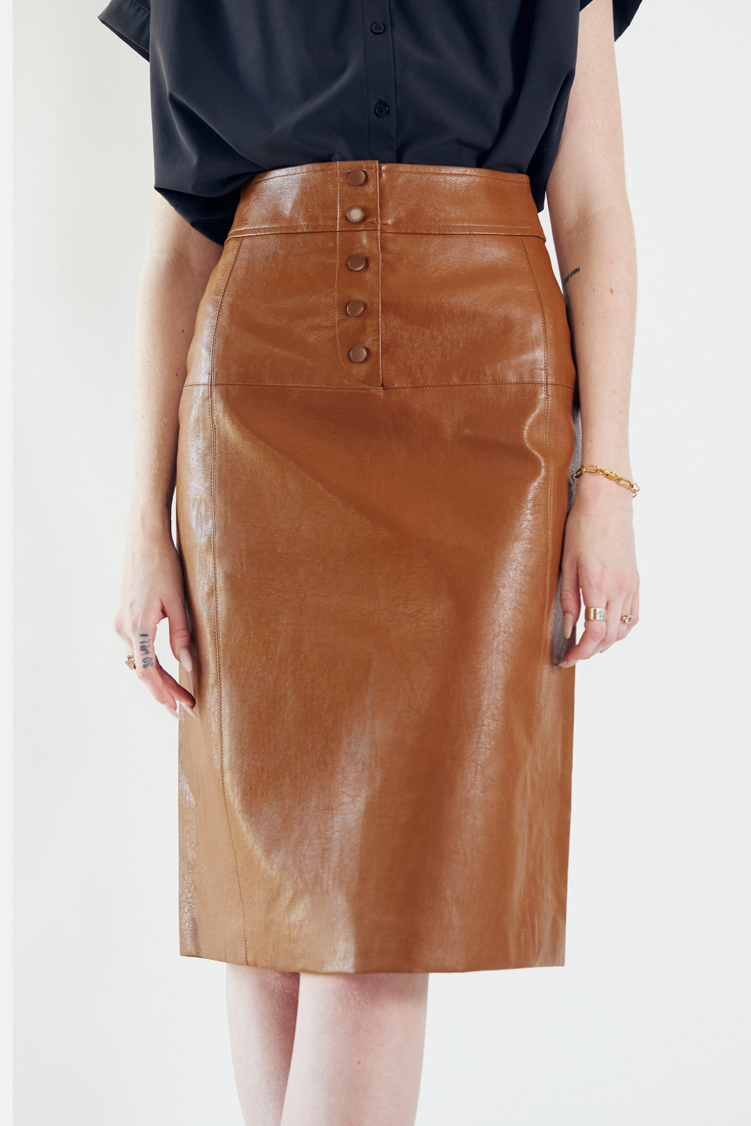 Make a confident statement with our Power Woman Dark Hazel Leather Skirt.