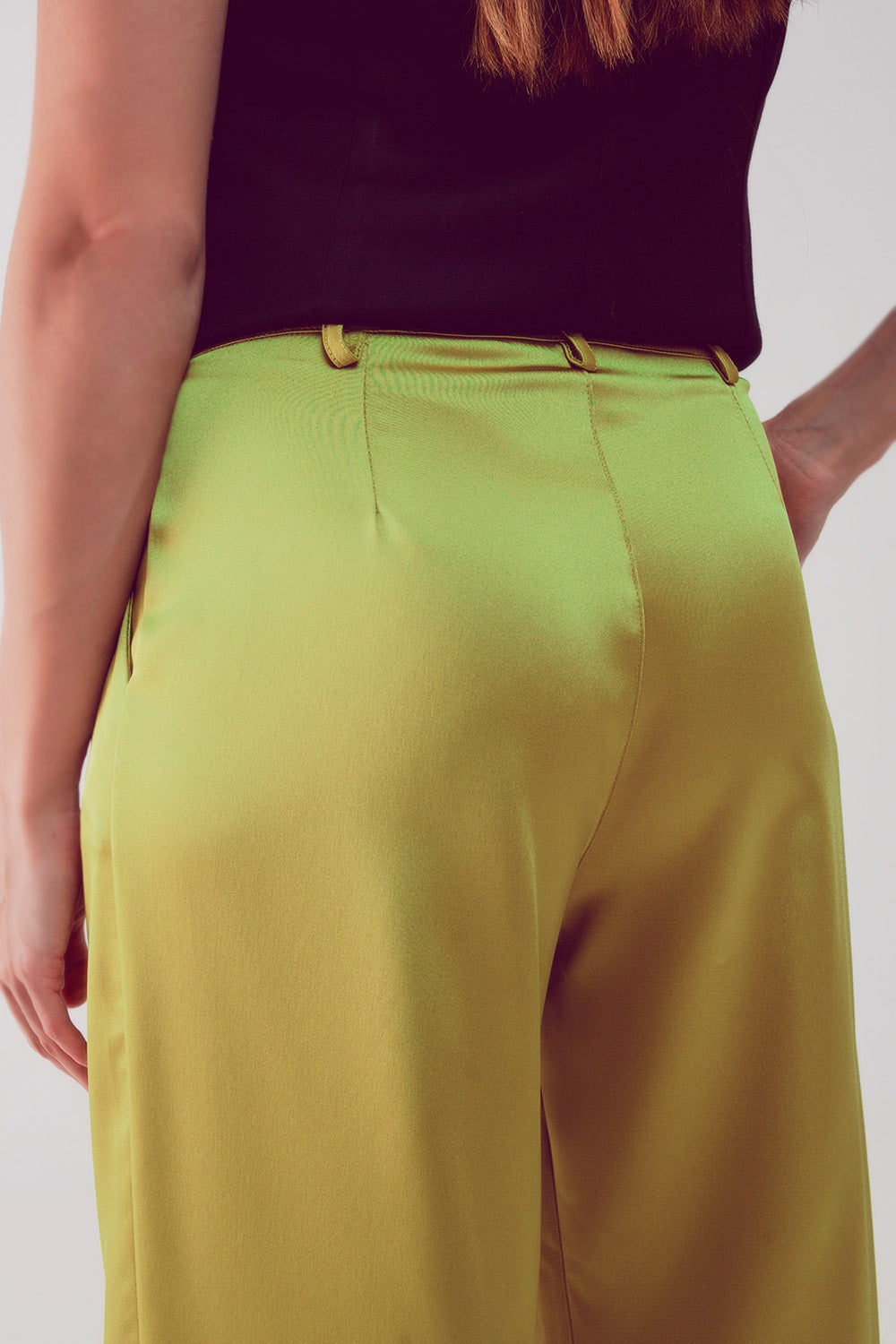 Make a bold statement with our Acid Lime Palazzo Pleated Pants.