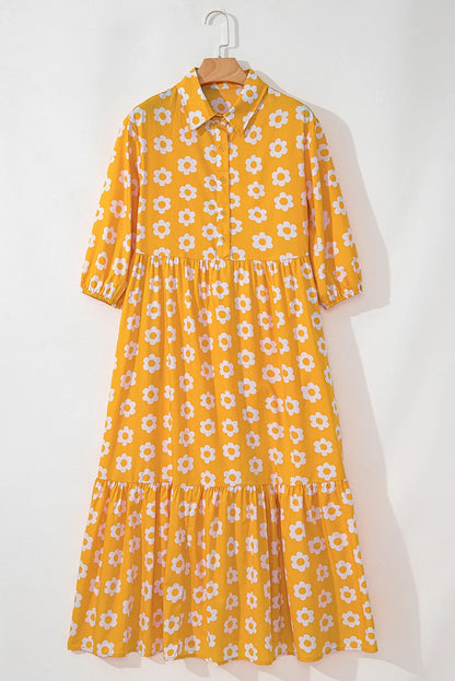 This charming yellow floral dress features a classic collar neckline and comfortable three-quarter sleeves.