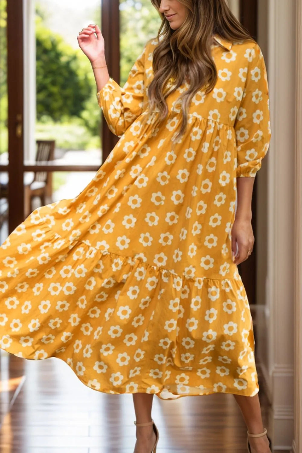 This charming yellow floral dress features a classic collar neckline and comfortable three-quarter sleeves.