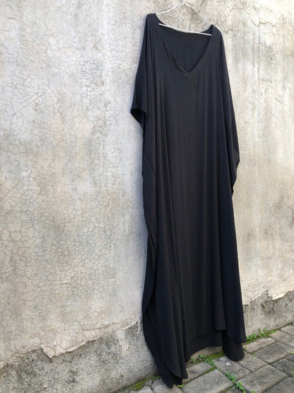 Transform your beach and resort looks with this versatile Boho Kaftan Dress.