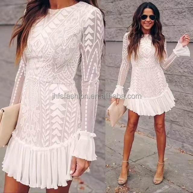 Embrace romantic elegance with this stunning White Lace Mini Dress.