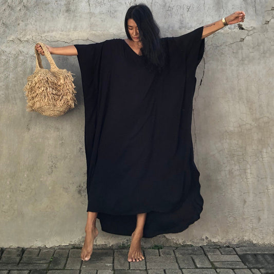 Transform your beach and resort looks with this versatile Boho Kaftan Dress.