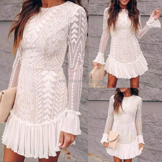 Embrace romantic elegance with this stunning White Lace Mini Dress.