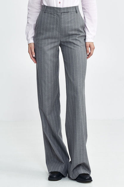 Step into timeless sophistication with Nife���s Model 199716 trousers.
