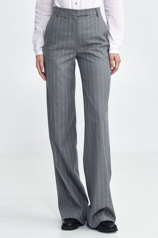 Step into timeless sophistication with Nife���s Model 199716 trousers.