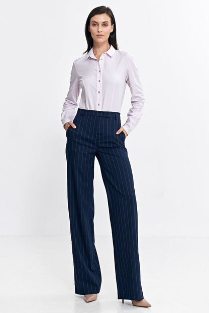 Elevate your everyday style with Nife���s Model 200390 trousers.