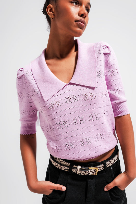 Add a touch of feminine charm to your wardrobe with our Pink Pointelle Knit Sweater.