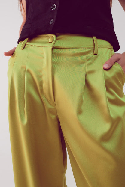 Make a bold statement with our Acid Lime Palazzo Pleated Pants.