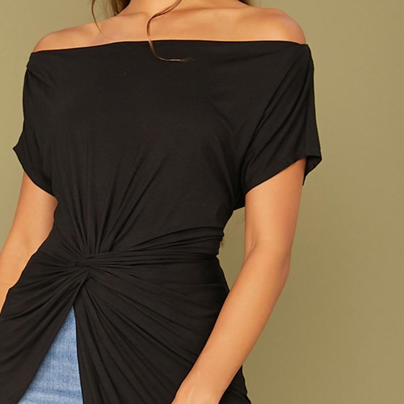 Transform your casual wardrobe with our sophisticated Black Asymmetrical Twist Off-Shoulder Top.