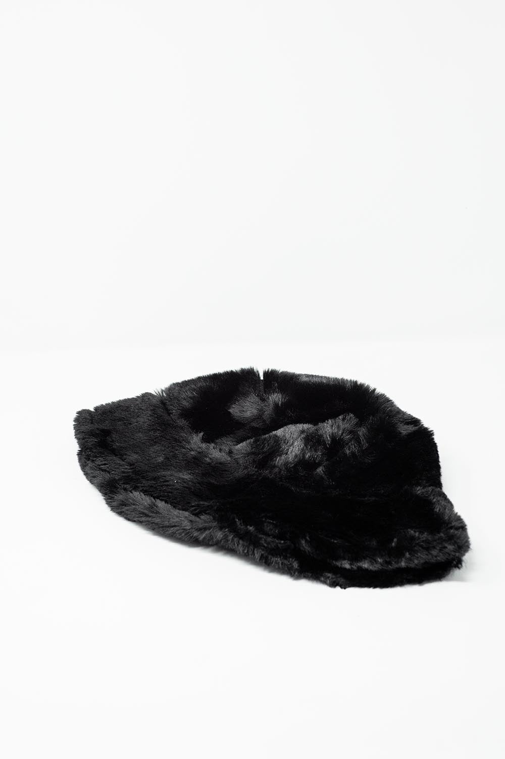 Upgrade your streetwear game with this ultra-soft Black Reversible Teddy Bucket Hat.